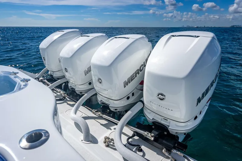 Slide: The Image of 2023 Yellowfin 39 Offshore boat with four powerful Mercury outboard engines on open water. - 69