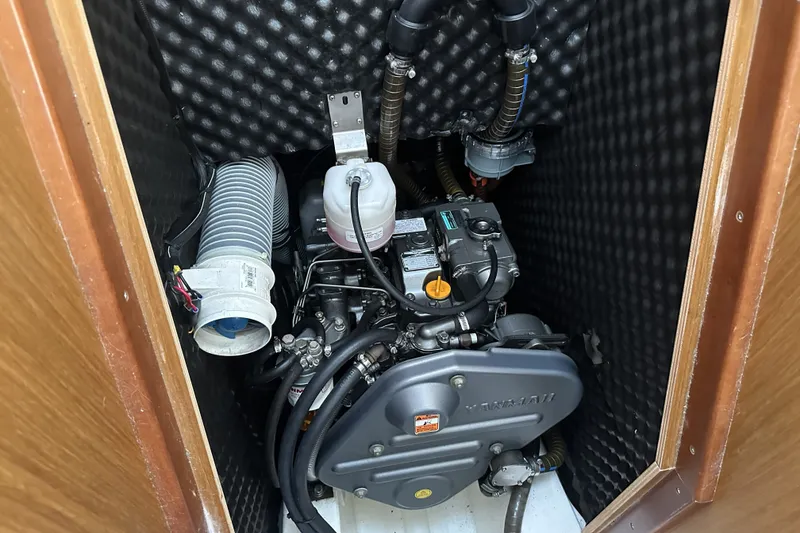 Slide: The Image of Engine compartment of 2007 Jeanneau Sun Odyssey 39 DS sailboat, featuring Yanmar engine. - 26