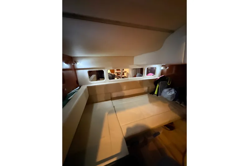 Slide: The Image of Interior cabin of 2007 Sea Ray Sundancer 310 with seating and windows. - 30