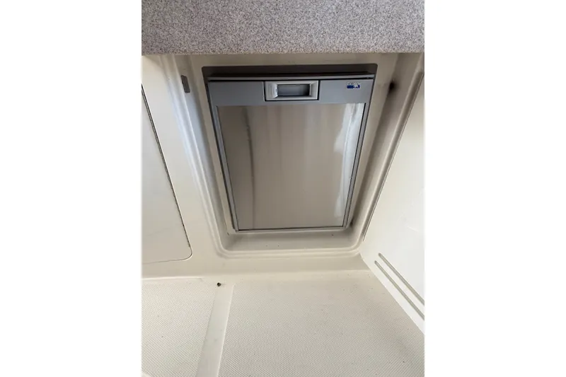 Slide: The Image of Compact refrigerator in 2007 Sea Ray Sundancer 310 boat interior. - 18