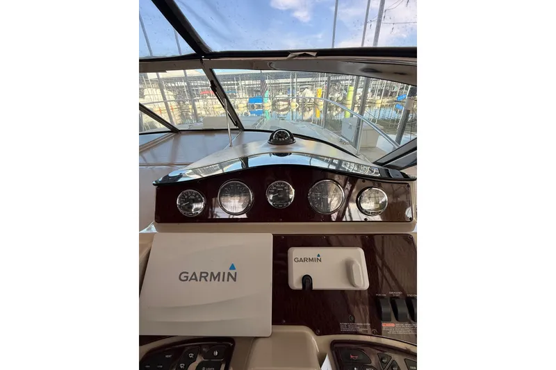 Slide: The Image of 2007 Sea Ray Sundancer 310 helm with Garmin navigation system and gauges. - 15