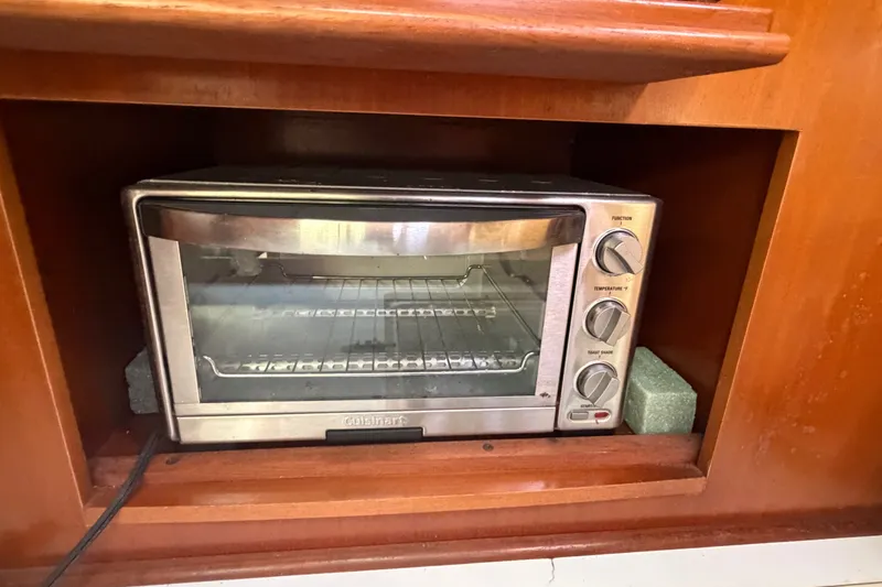 Slide: The Image of Toaster oven in wooden cabinet on Beneteau Oceanis 393 yacht, 2003 model. - 9