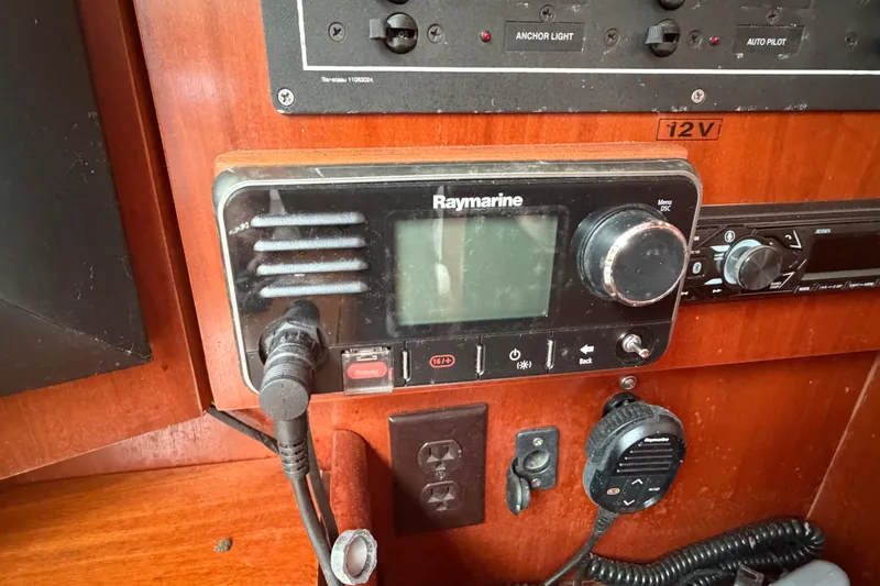Slide: The Image of Raymarine marine radio on 2003 Beneteau Oceanis 393 yacht control panel. - 18