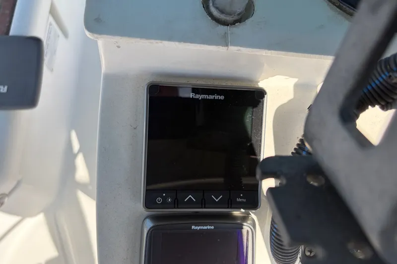 Slide: The Image of Raymarine navigation equipment on a 2003 Beneteau Oceanis 393 sailboat. - 38