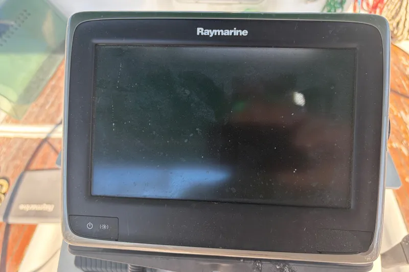 Slide: The Image of Raymarine navigation display on a 2003 Beneteau Oceanis 393 sailboat. - 36