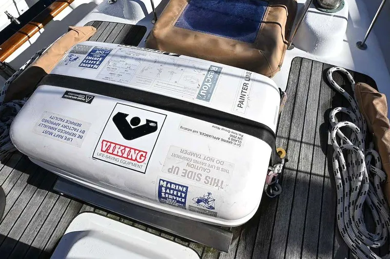 Slide: The Image of Viking life-saving equipment on 1982 Passport Hoyt 45 sailboat deck. - 28