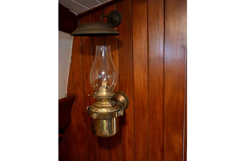 Slide: The Image of Vintage brass oil lamp on wooden wall, Passport/Hoyt 45, 1982 model. - 78