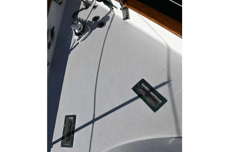 Slide: The Image of Deck of 1982 Passport Hoyt 45 sailboat with winch and fittings. - 37