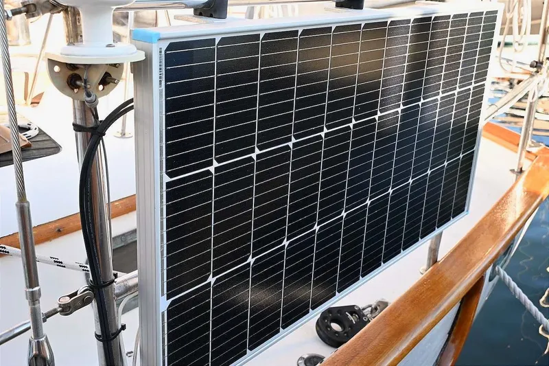 Slide: The Image of Solar panel mounted on a 1982 Passport / Hoyt 45 sailboat deck. - 46