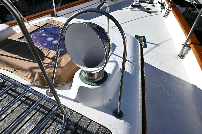 Slide: The Image of Deck of 1982 Passport Hoyt 45 sailboat with stainless steel fittings and ventilation. - 35