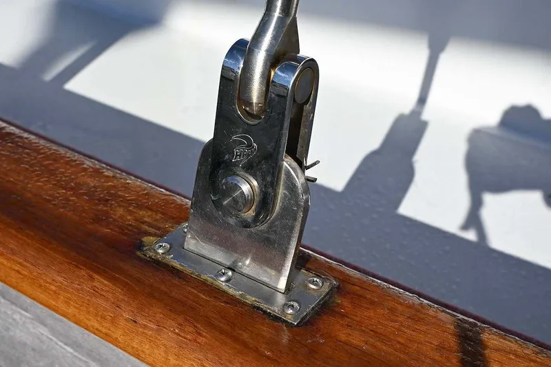 Slide: The Image of Stainless steel fitting on wooden deck of 1982 Passport Hoyt 45 sailboat. - 42