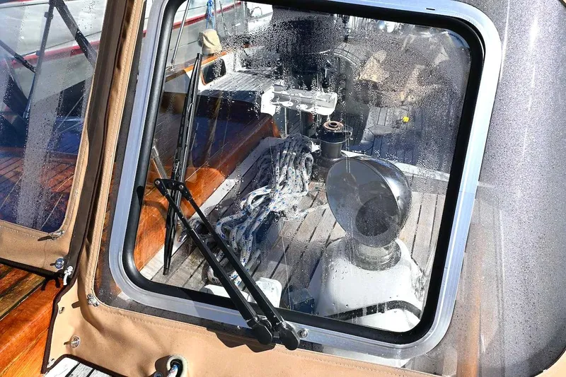 Slide: The Image of Cockpit view of 1982 Passport Hoyt 45 sailboat with winch and ropes. - 20