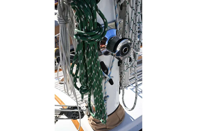 Slide: The Image of Close-up of sailing ropes and winch on a 1982 Passport Hoyt 45 sailboat. - 24