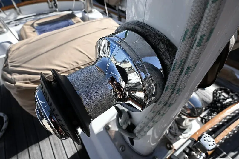 Slide: The Image of Close-up of a 1982 Passport Hoyt 45 sailboat winch with ropes on deck. - 29