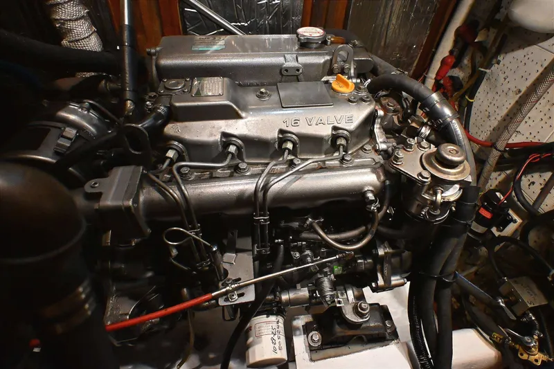 Slide: The Image of Engine compartment of a 1982 Passport / Hoyt 45, featuring a 16-valve engine. - 93