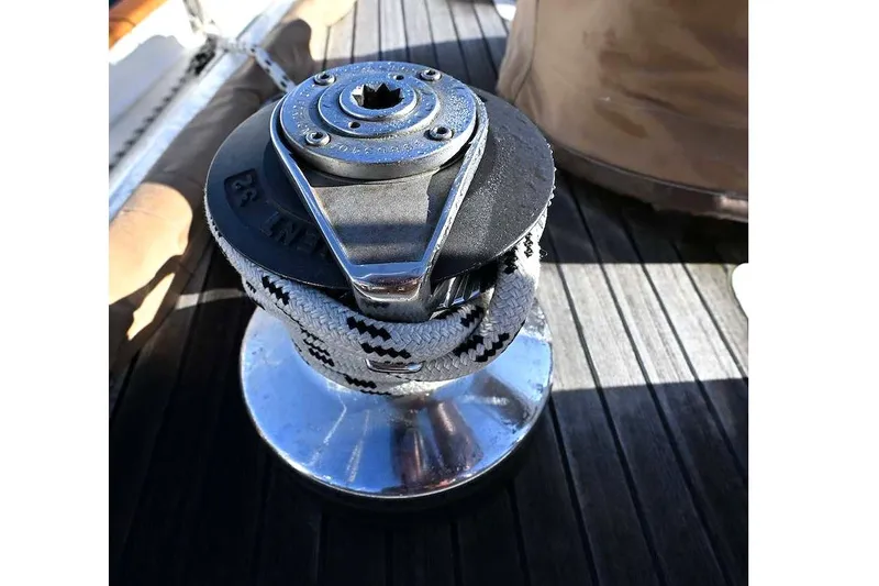 Slide: The Image of Sailboat winch with rope on deck, Passport/Hoyt 45, 1982 model. - 19