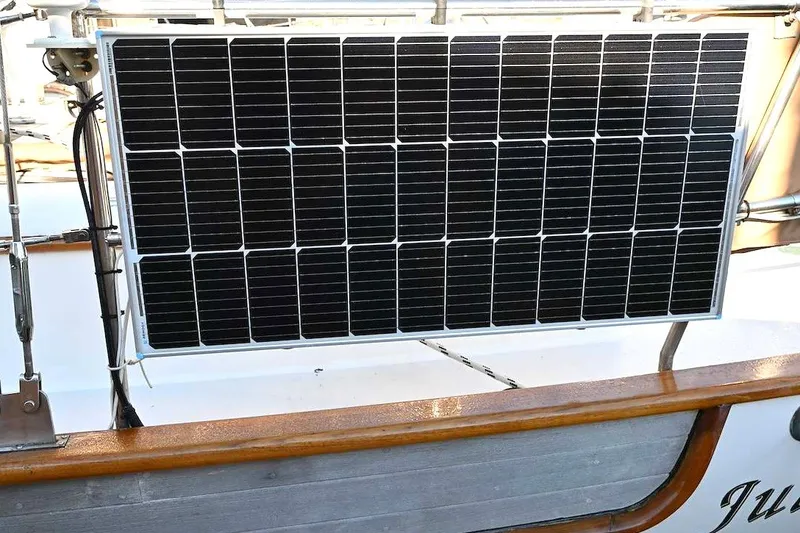 Slide: The Image of Solar panel mounted on a 1982 Passport / Hoyt 45 sailboat deck. - 47