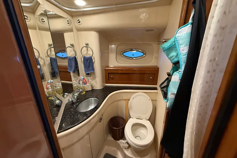 Slide: The Image of Luxurious bathroom in 2007 Meridian 411 Sedan yacht with modern amenities. - 15