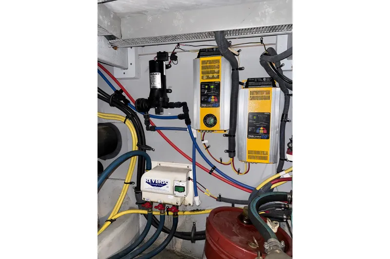 Slide: The Image of Engine room of a 2007 Meridian 411 Sedan with electrical components and wiring. - 22