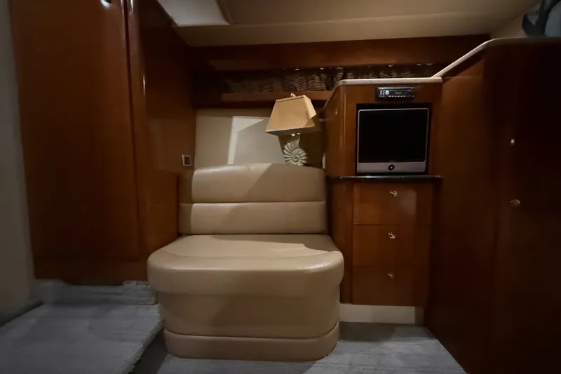 Slide: The Image of Interior of 2007 Meridian 411 Sedan with beige seating and wooden cabinetry. - 14