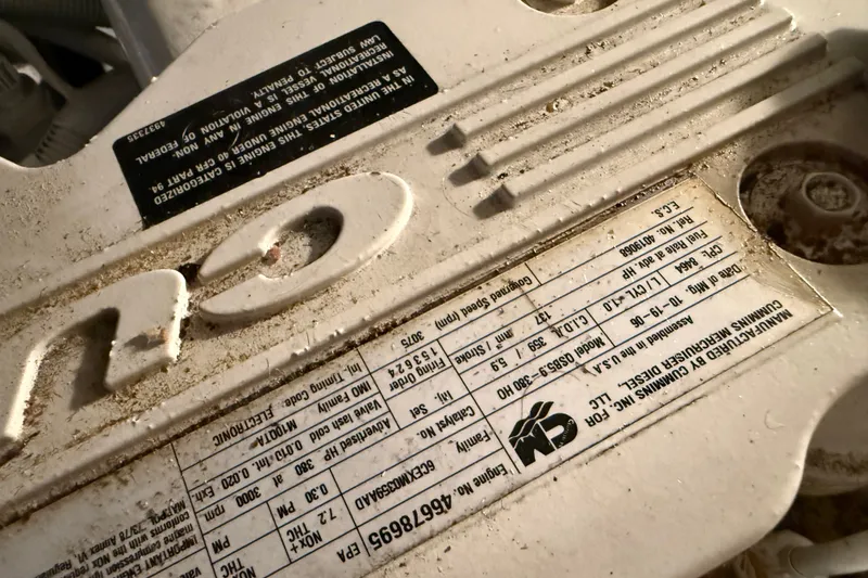 Slide: The Image of Engine label on a 2007 Meridian 411 Sedan, showing specifications and manufacturer details. - 19