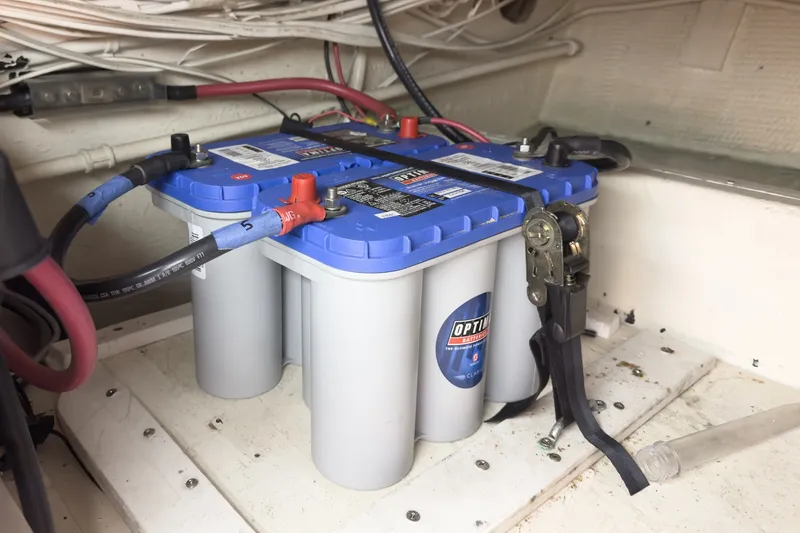 Slide: The Image of Battery setup in a 1971 Hatteras 53 Motor Yacht engine room. - 33