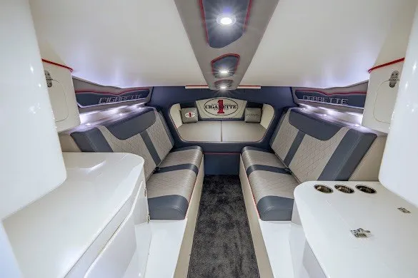 Slide: The Image of Luxurious interior of a 2018 Cigarette 42X boat with plush seating and modern design. - 39