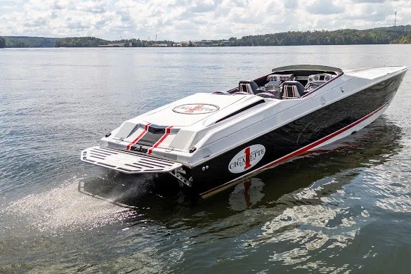 Slide: The Image of 2018 Cigarette 42X speedboat on calm water, showcasing sleek design and powerful performance. - 10
