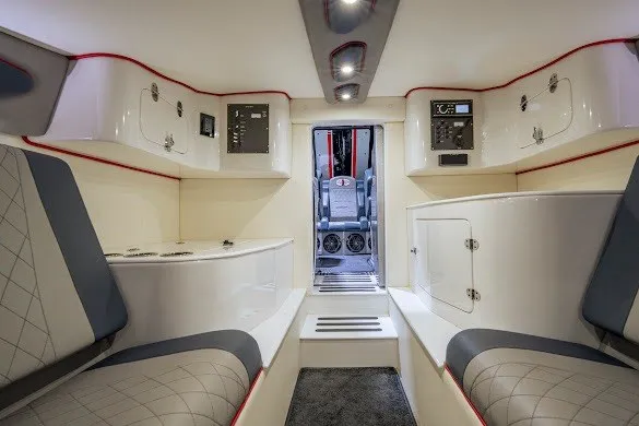 Slide: The Image of Interior of a 2018 Cigarette 42X boat, featuring modern seating and control panels. - 36