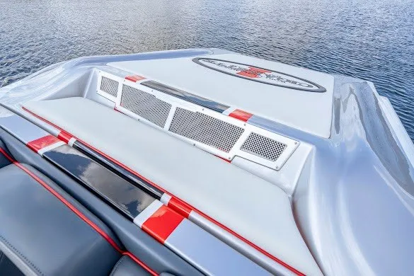 Slide: The Image of 2018 Cigarette 42X boat deck with sleek design and red accents on water. - 22