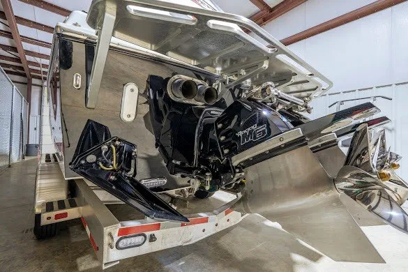 Slide: The Image of 2018 Cigarette 42X boat engine and propeller in a storage facility. - 44