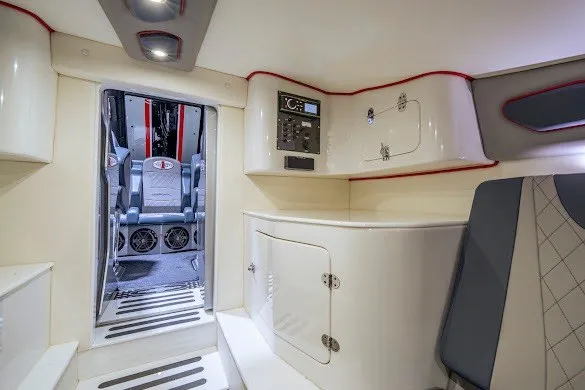 Slide: The Image of Interior of 2018 Cigarette 42X boat, featuring modern design and control panel. - 34