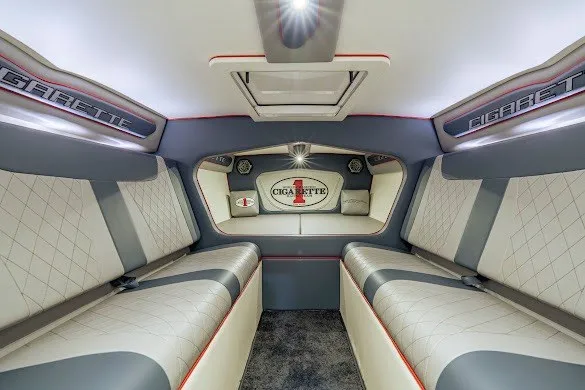 Slide: The Image of Luxurious interior of a 2018 Cigarette 42X boat with elegant seating and ambient lighting. - 38