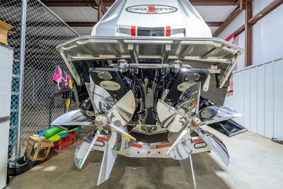 Slide: The Image of 2018 Cigarette 42X boat with dual propellers in a storage facility. - 45