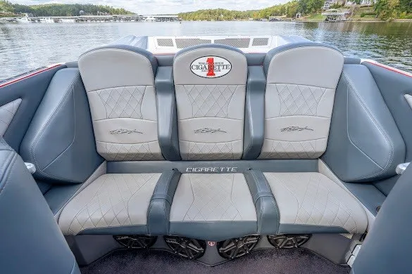 Slide: The Image of 2018 Cigarette 42X boat interior with gray leather seating and lake view. - 32
