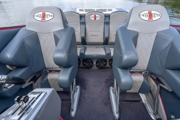 Slide: The Image of 2018 Cigarette 42X boat interior with luxurious seating and branded upholstery. - 26