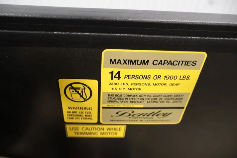 Slide: The Image of 2027 Bentley Pontoons 200 CRUISE XL capacity label: 14 persons or 1900 lbs, 115 HP motor. - 18