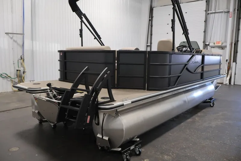 Slide: The Image of 2027 Bentley Pontoons 200 CRUISE XL in a warehouse setting, showcasing sleek design. - 4