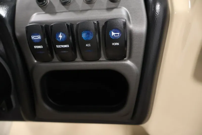 Slide: The Image of Control panel of 2027 Bentley Pontoons 200 CRUISE XL with labeled switches. - 8