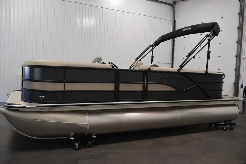 Slide: The Image of 2027 Bentley Pontoons 200 CRUISE XL in showroom, featuring sleek design and modern amenities. - 26