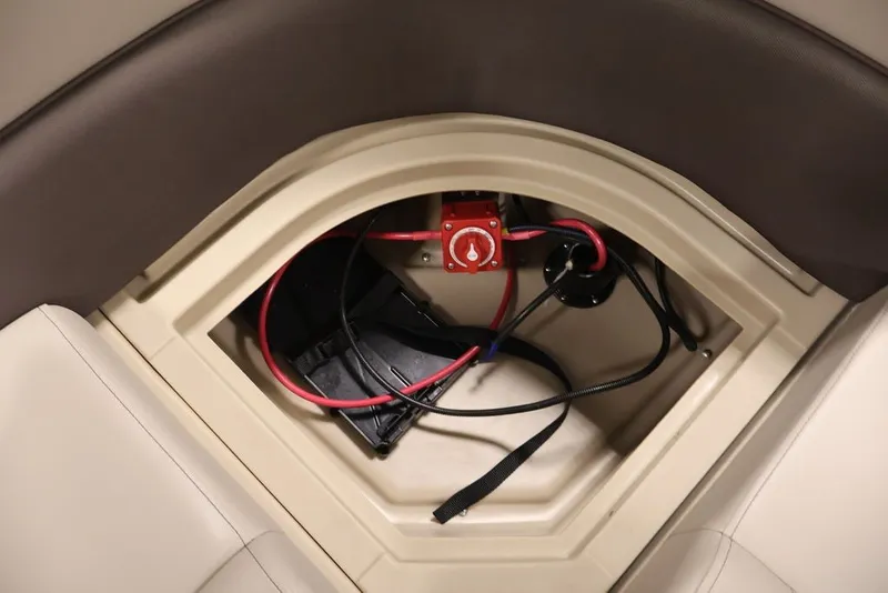 Slide: The Image of Battery compartment of 2027 Bentley Pontoons 200 CRUISE XL with wiring and switch. - 27