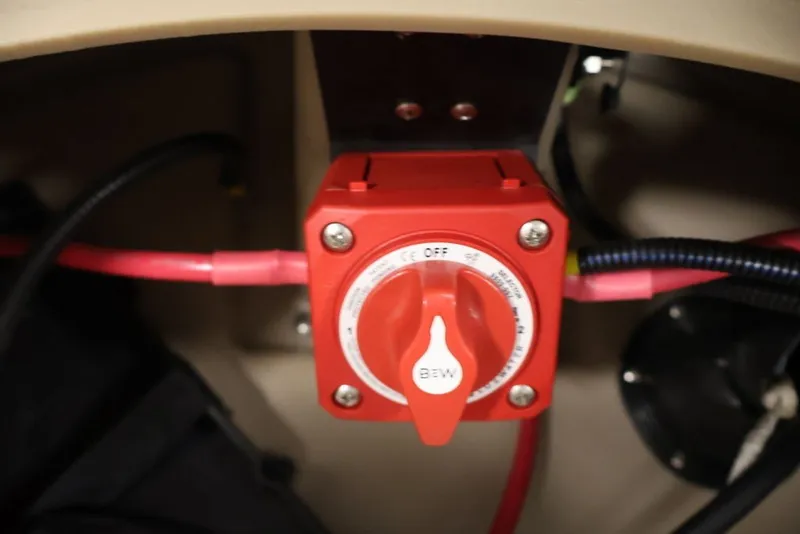 Slide: The Image of Red battery switch in a 2027 Bentley Pontoons 200 CRUISE XL boat. - 10