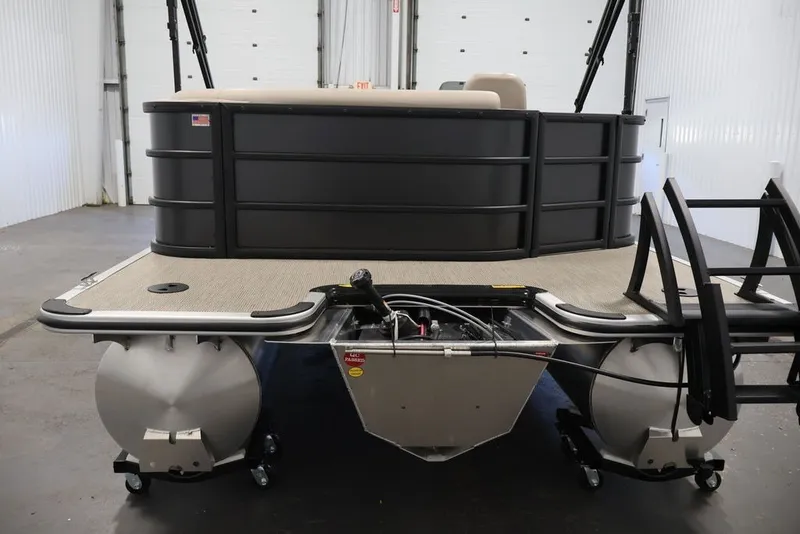 Slide: The Image of 2027 Bentley Pontoons 200 CRUISE XL in a showroom, showcasing rear deck and pontoons. - 3