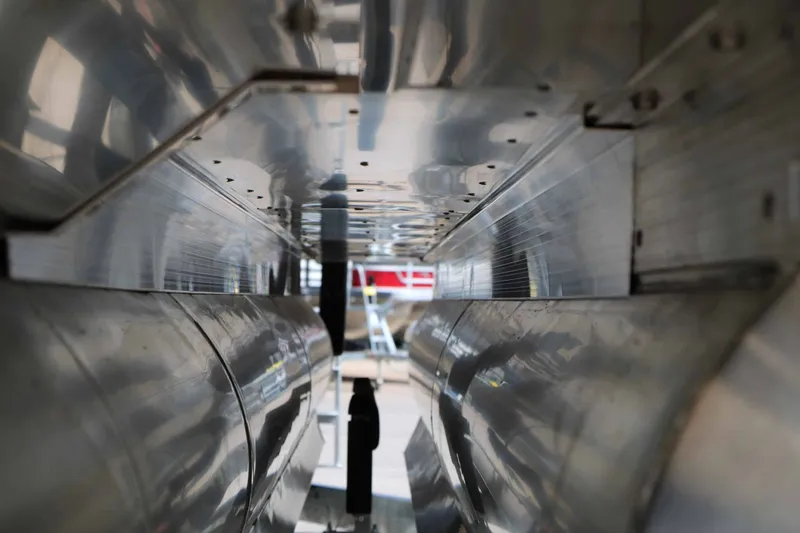Slide: The Image of Close-up of the underside of a 2027 Bennington 26 MSBA Tri Toon. - 24
