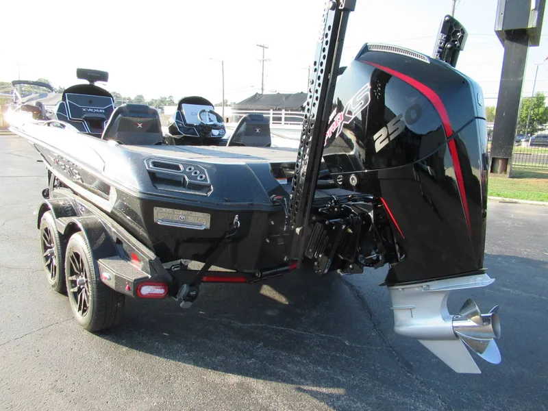 Slide: The Image of The image shows a 2027 Vexus VXs21 boat with a powerful outboard motor. - 7