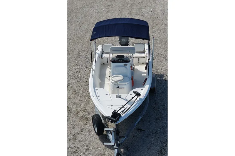 Slide: The Image of 2009 NauticStar 1810 NauticBay boat with canopy on trailer, viewed from above. - 8