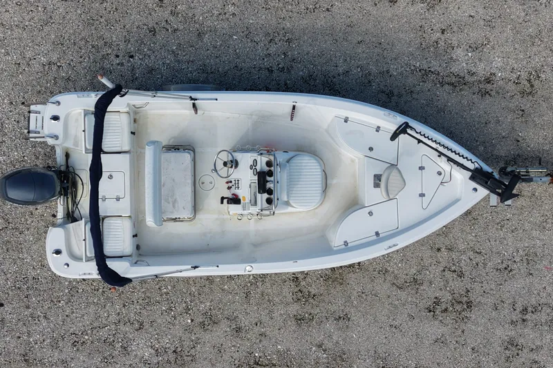 Slide: The Image of Top view of a 2009 NauticStar 1810 NauticBay boat on gravel surface. - 7