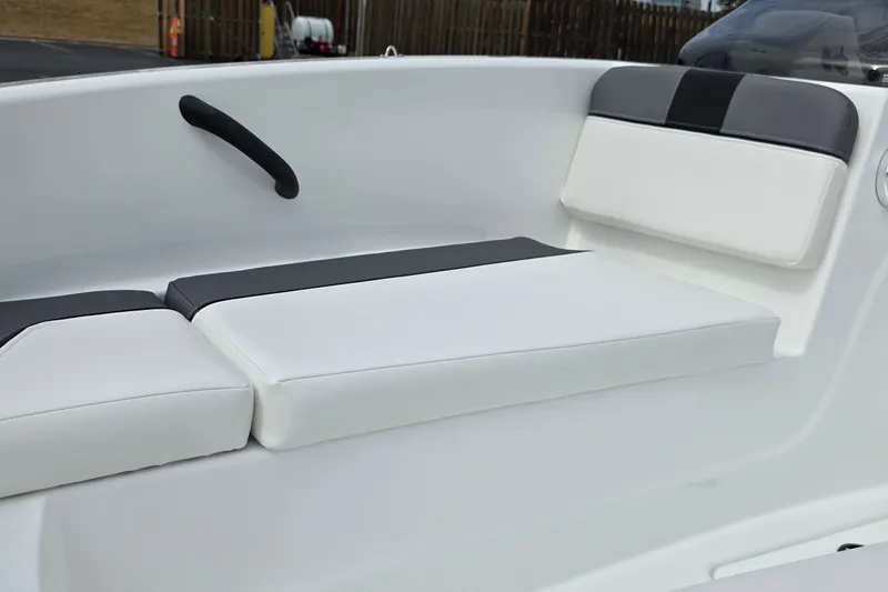 Slide: The Image of Interior seating of 2027 Tahoe T16 boat, featuring sleek white and gray cushions. - 9