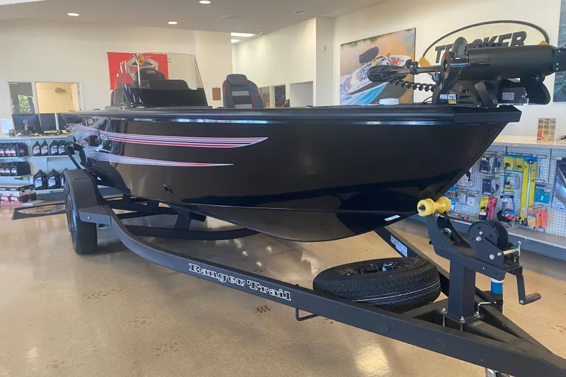 Slide: The Image of 2026 Ranger VS1882SC Reata boat displayed in showroom on trailer. - 4