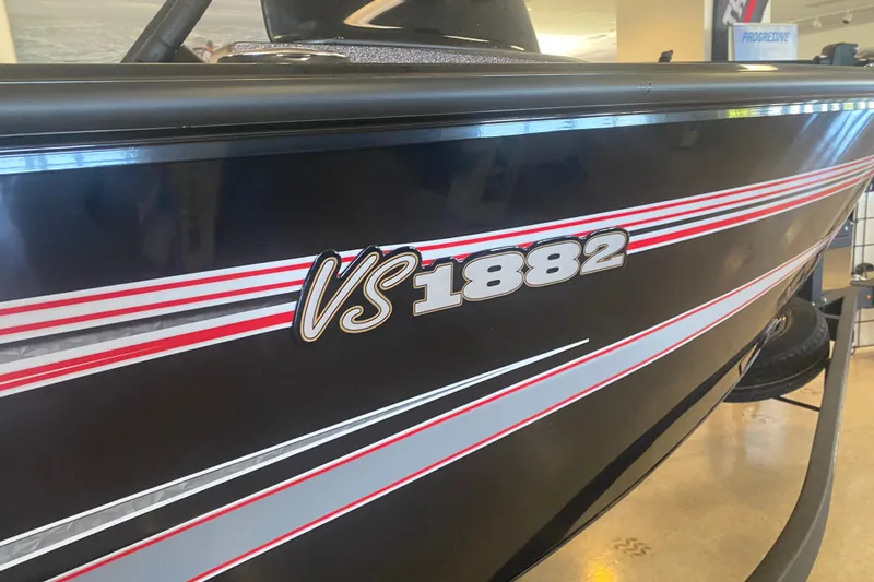 Slide: The Image of 2026 Ranger VS1882SC Reata boat with sleek black and red detailing. - 3